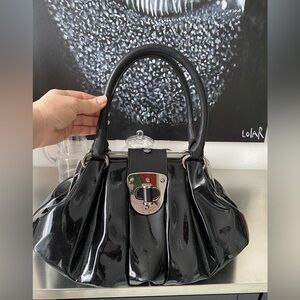 Alexander McQueen Black Satchel with Glossy Finish and Silver Clasp